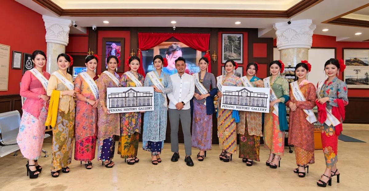 A group of visitors enjoying their visit to Penang History Gallery